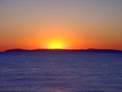 Sunset over Catalina Island, creating a serene and beautiful scene